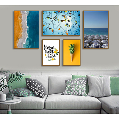 Decor phòng ngủ nhỏ với khung ảnh treo tường ấm áp