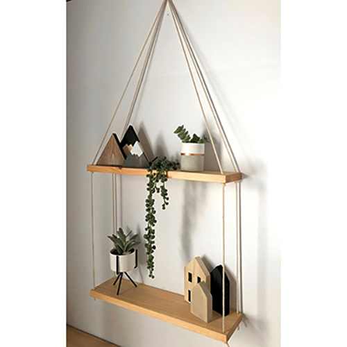 Decor phòng ngủ nhỏ với kệ treo tường giúp tận dụng không gian tối ưu